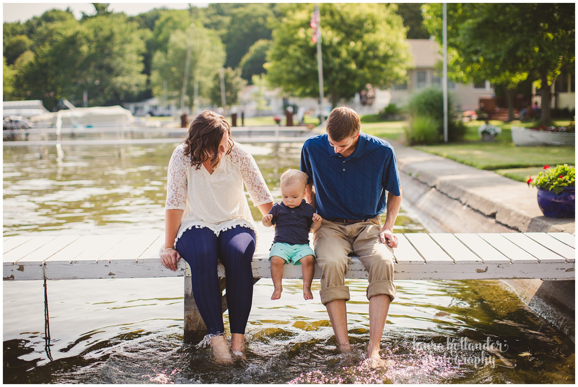one year milestone, family of three, baby boy on dock at the lake