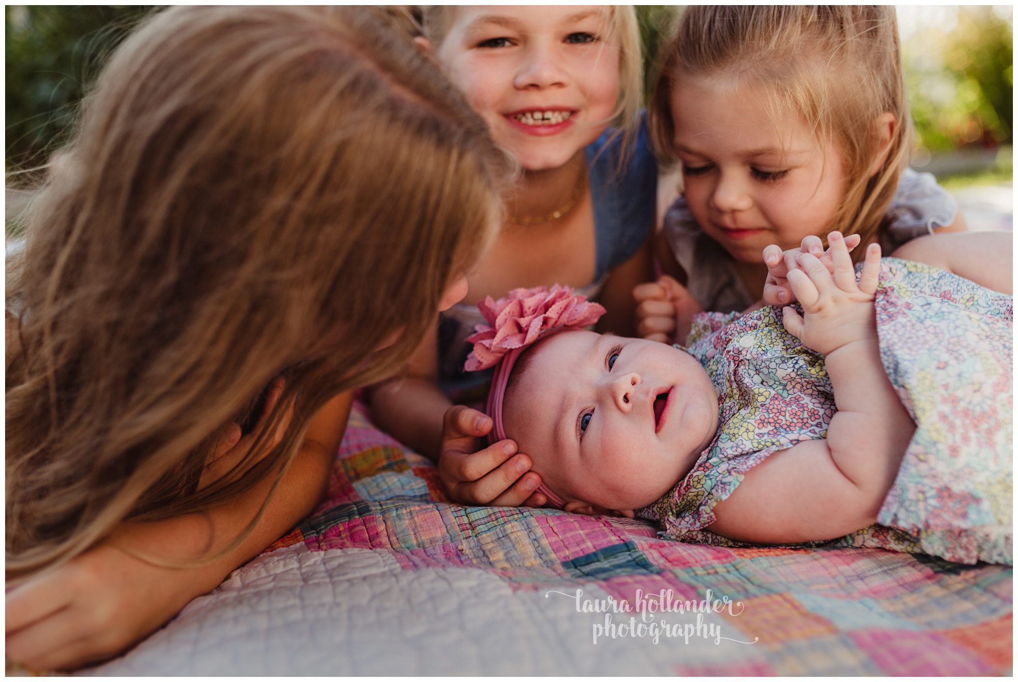 family of 6, four daughters, family portraits with quilt backdrop, Laura Hollander Photography Battle Creek MI