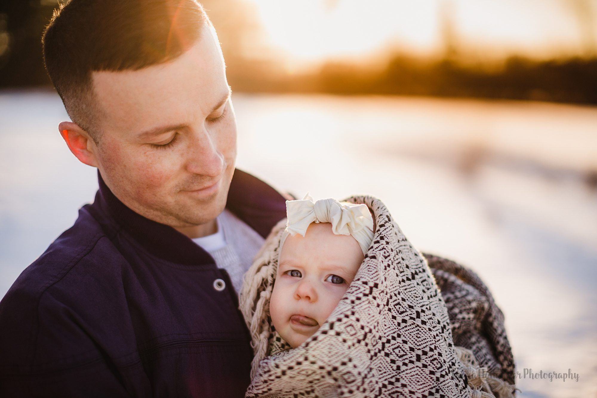 dad and baby girl, winter family portraits in southwest Michigan with Laura Hollander Photography
