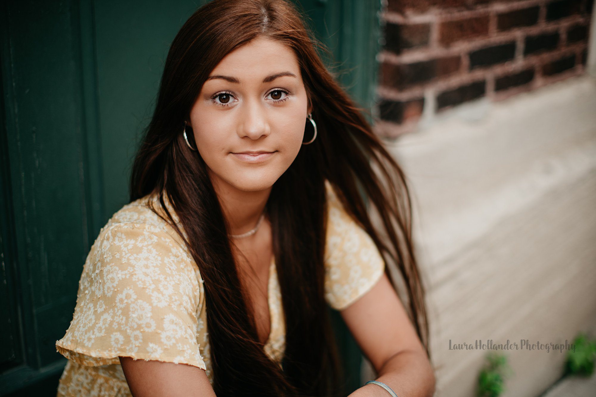 senior girl photos, senior girl with long hair, urban senior session in St. Joseph, MI with Laura Hollander Photography